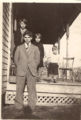 06 Ella, Bertha, Robert on porch, Loy in front, Beals house.jpg